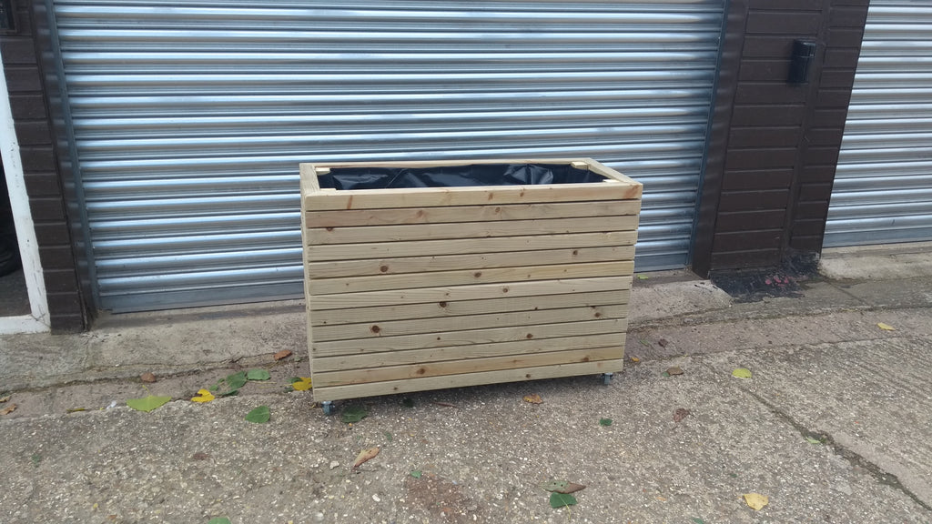 Block style trough wooden planters (tall) with spaces between the rows