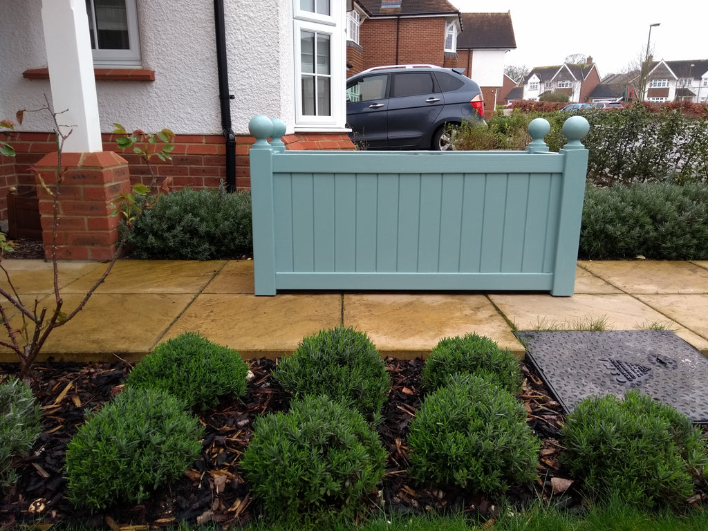 Versailles trough planters painted with Cuprinol's Seagrass