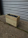 Smooth trough wooden planters with 3 rows of planks
