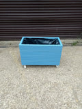 Wooden planters on wheels / casters painted in Cuprinol's Forget - Me - Not
