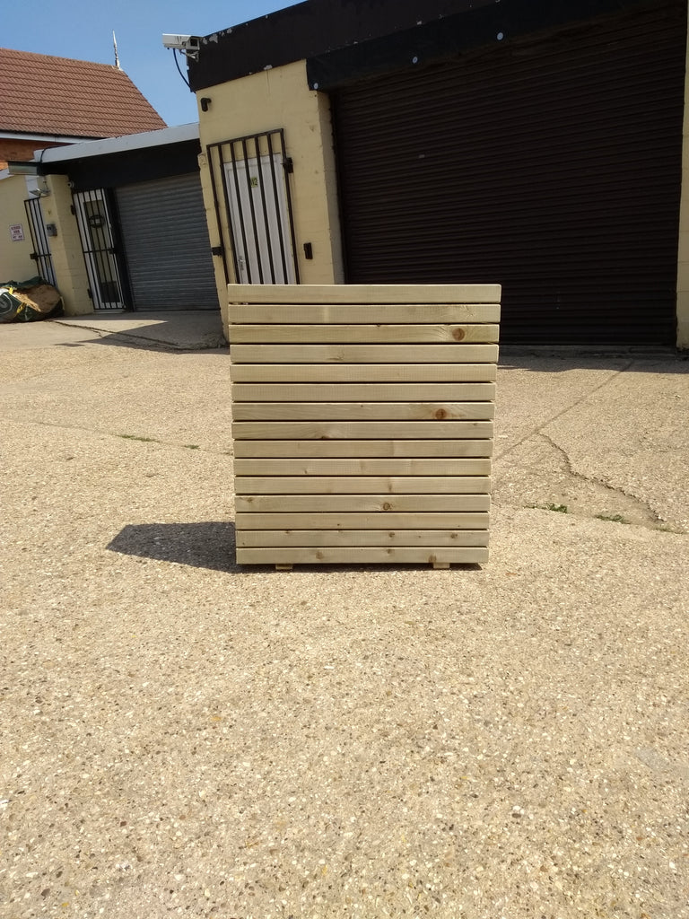 Block style trough wooden planters with spaces between the rows - narrow and tall