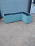 L shaped corner wooden planters, 4 rows of decking, painted in Cuprinol's Seagrass
