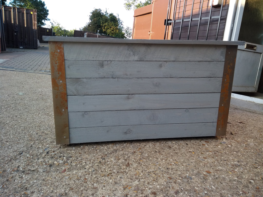 Reclaimed timber style wooden planters with rusted metal corners
