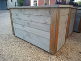 Reclaimed timber style wooden planters with rusted metal corners