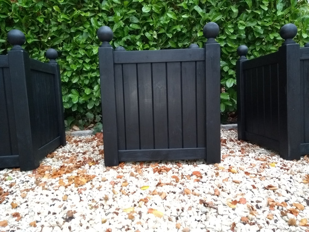 Versailles square wooden planters painted with Cuprinol's Black Ash
