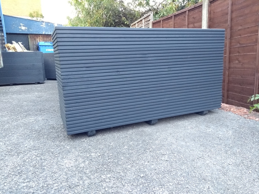 5 rows of decking large trough wooden planters painted in Cuprinol's Urban Slate
