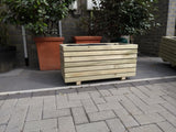 Block style trough wooden planters (short) with spaces between the rows
