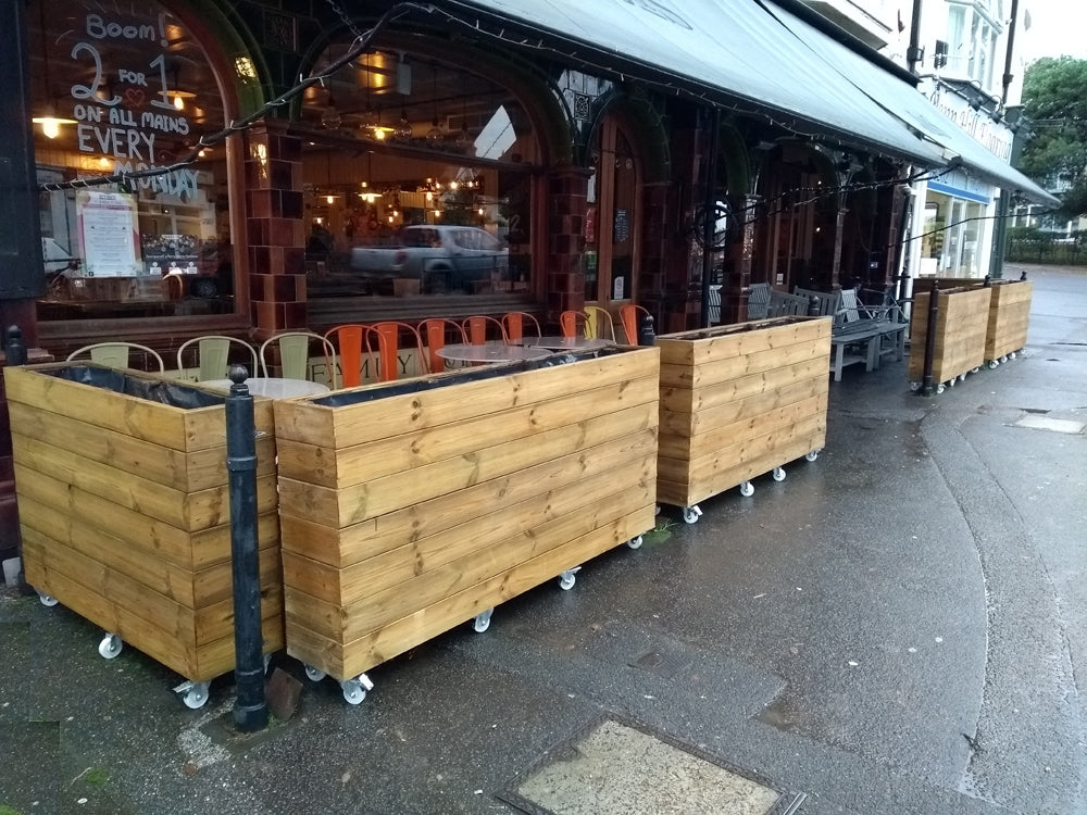 Wooden planters on wheels / casters for bars / restaurants
