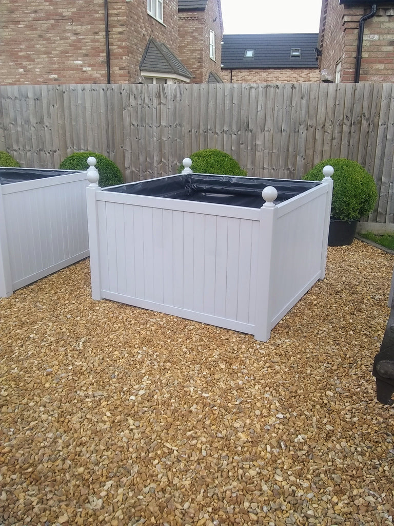 Versailles square wooden planters painted with Farrow and Ball's Pavillion Grey