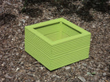 Lime Green 40cm square planter made from 2 rows of treated decking