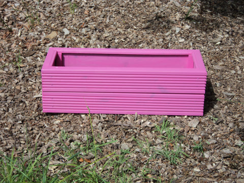 Pink 60cm trough planter made from 2 rows of treated decking