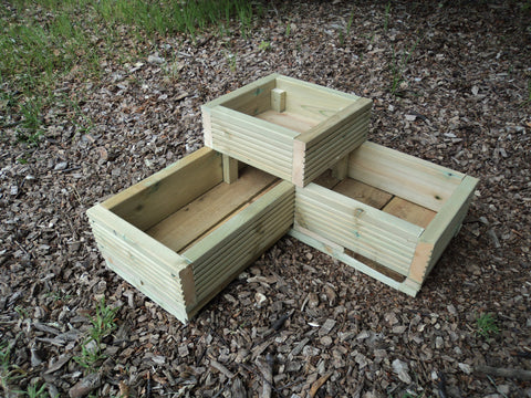 Budget L shaped corner wooden planters made from decking