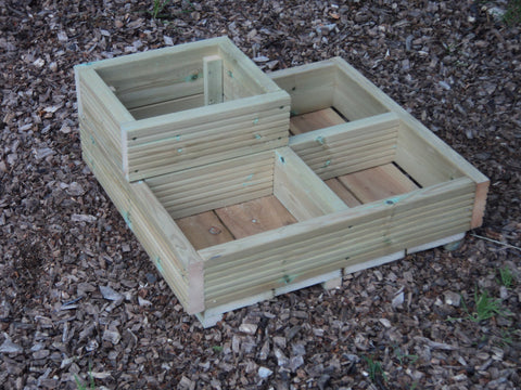 Budget square decking wooden planter consisting of 4 cells.