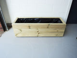 3 rows of decking trough wooden planters