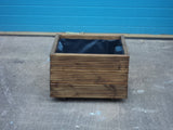 Square wooden planters, 3 rows of decking, stained medium oak