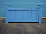 Versailles trough planters painted with Cuprinol's Forget-Me-Not