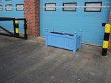 Versailles trough planters painted with Cuprinol's Forget-Me-Not