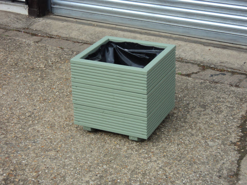 Square wooden planters, 3 rows of decking, painted in Cuprinol's Willow