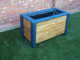 Aston trough wooden planter - painted with Cuprinol's Urban Slate and Light Oak Stained rows of timber