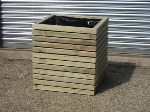 Block style square wooden planters with spaces between the rows