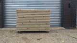 Block style trough wooden planters (tall) with spaces between the rows