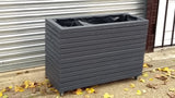 Block style trough wooden planters with spaces between the rows painted with Cuprinol's Urban Slate