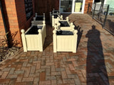 Versailles square wooden planters painted with Cuprinol's Country Cream