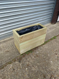Smooth trough wooden planters with 3 rows of planks