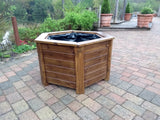 Aston hexagonal wooden planters - stained with warm oak woodstain