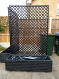 Block style trough wooden planters with trellis painted with Cuprinol's Black Ash