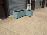 L shaped corner wooden planters, 4 rows of decking, painted in Cuprinol's Seagrass