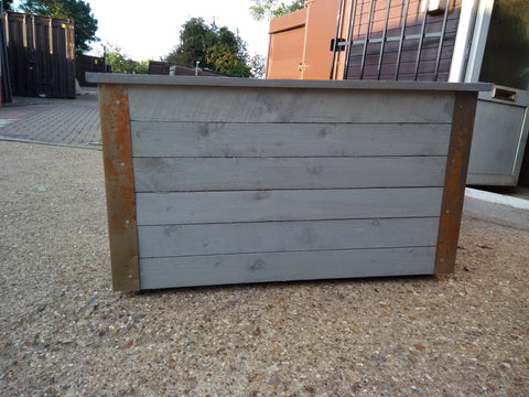 Reclaimed timber style wooden planters with rusted metal corners