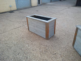 Reclaimed timber style wooden planters with rusted metal corners
