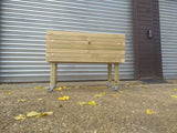 Block style raised wooden planters on casters / wheels and varnished