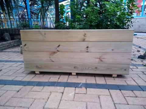 Smooth trough wooden planters with 4 rows of planks