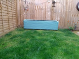 Block style trough wooden planters painted in Cuprinol's Seagrass