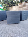 Square wooden planters, 5 rows of decking, painted in Cuprinol's Urban Slate