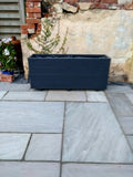 4 rows of decking large trough wooden planters painted in Cuprinol's Urban Slate