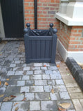 Versailles square wooden planters painted with Farrow and Ball's Off Black